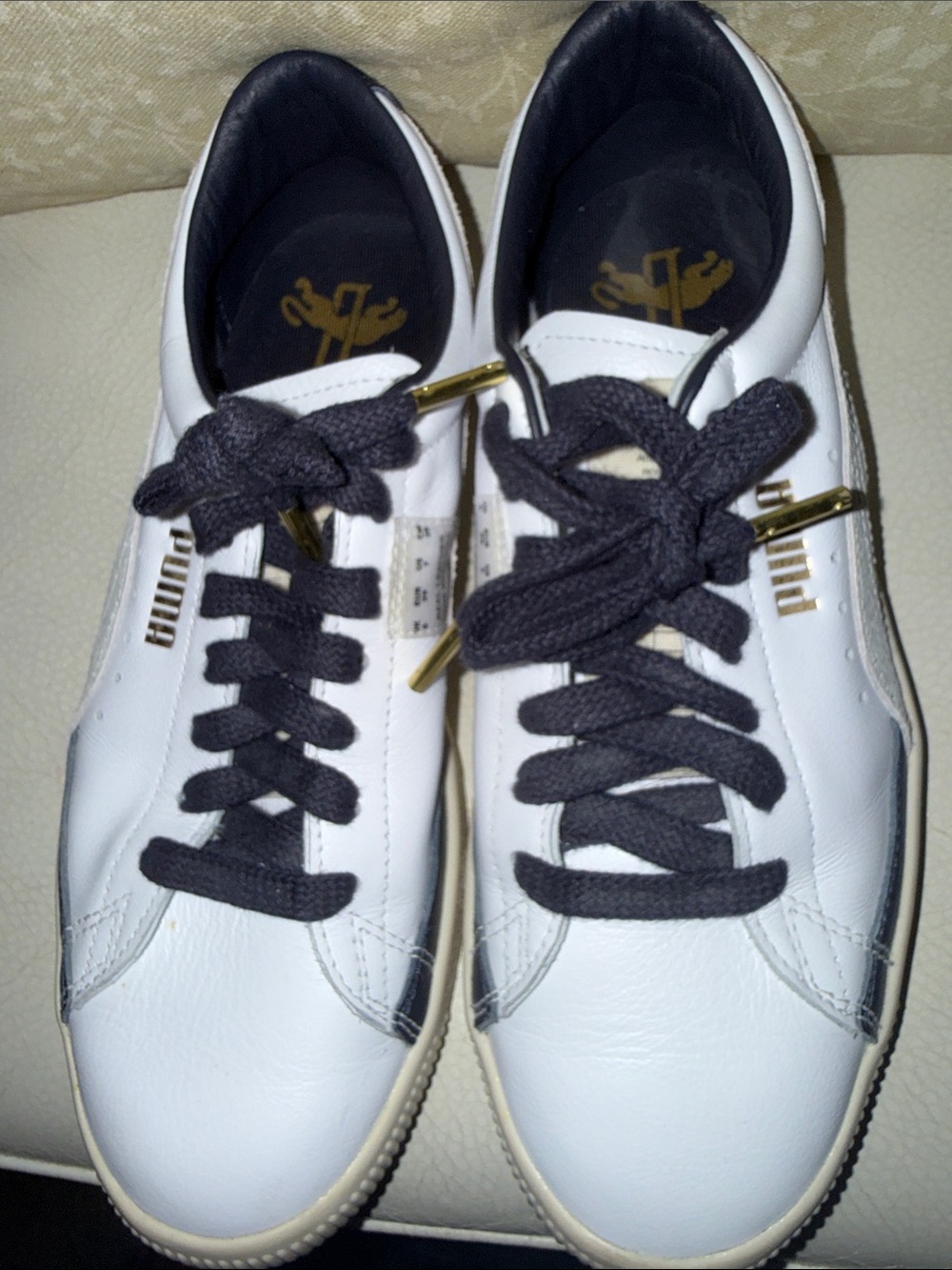 Puma White Leather Sneakers with Navy Laces and Gold Accents